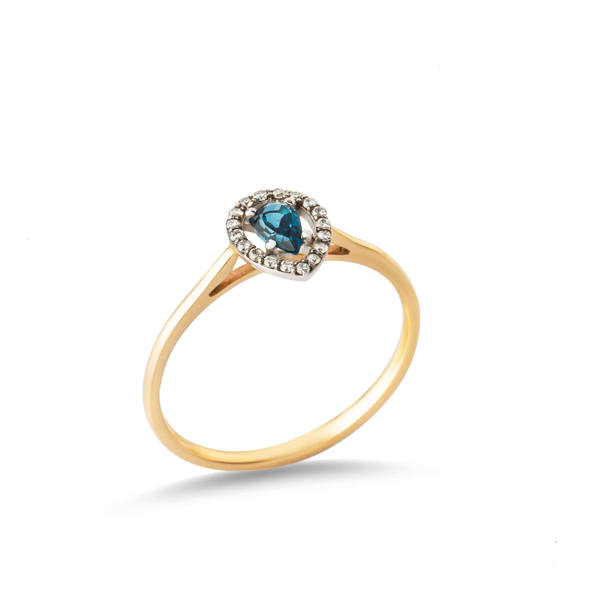 Blue topaz pear shaped diamond ring — Melina Fachidis