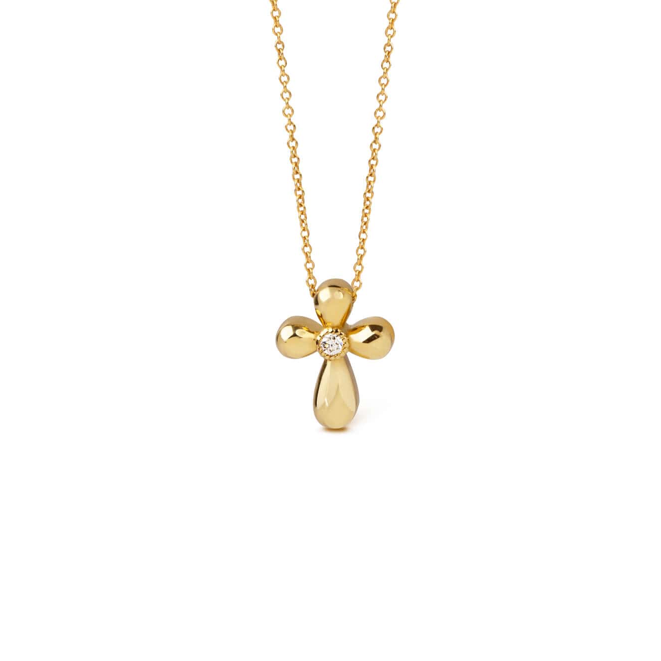 Curved gold cross with a diamond — Melina Fachidis