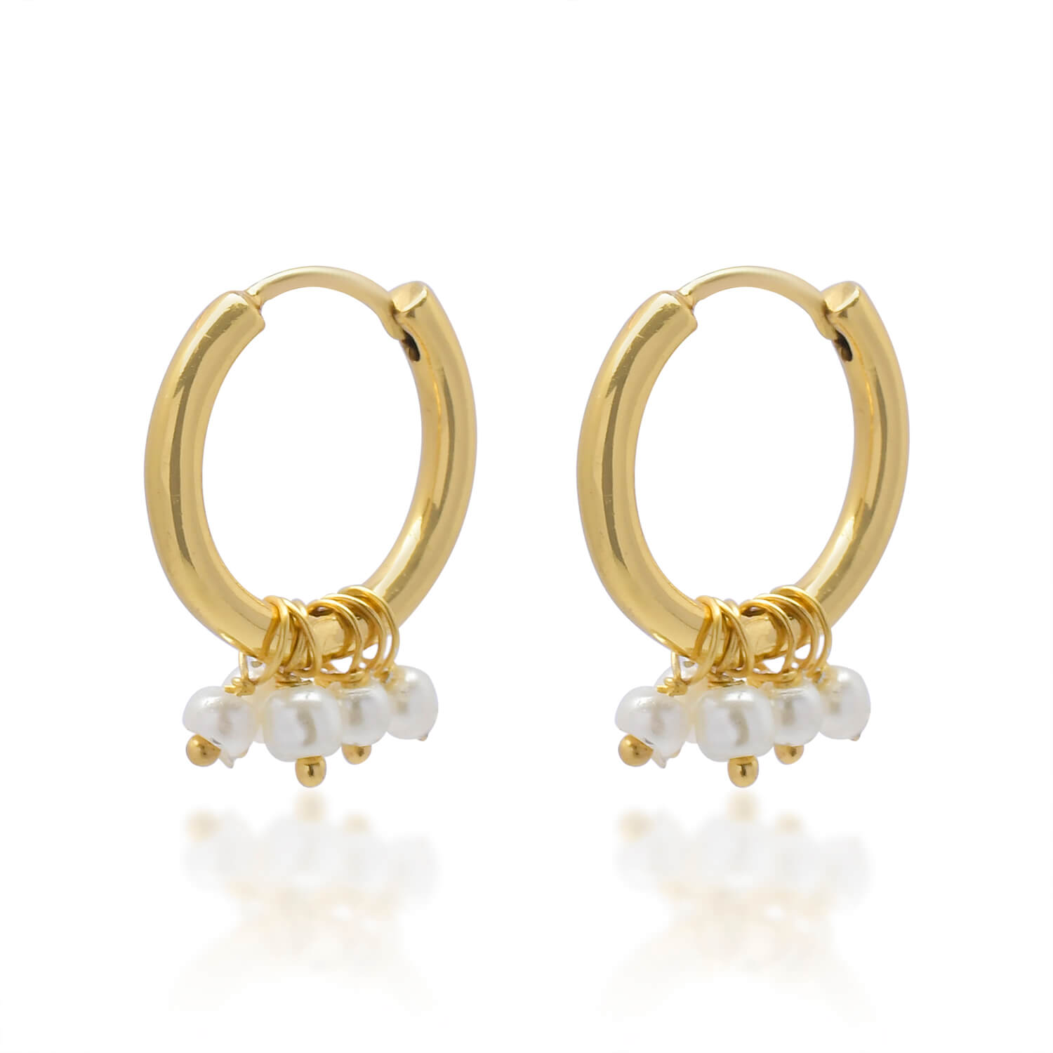Huggie earrings with small earls — Melina Fachidis