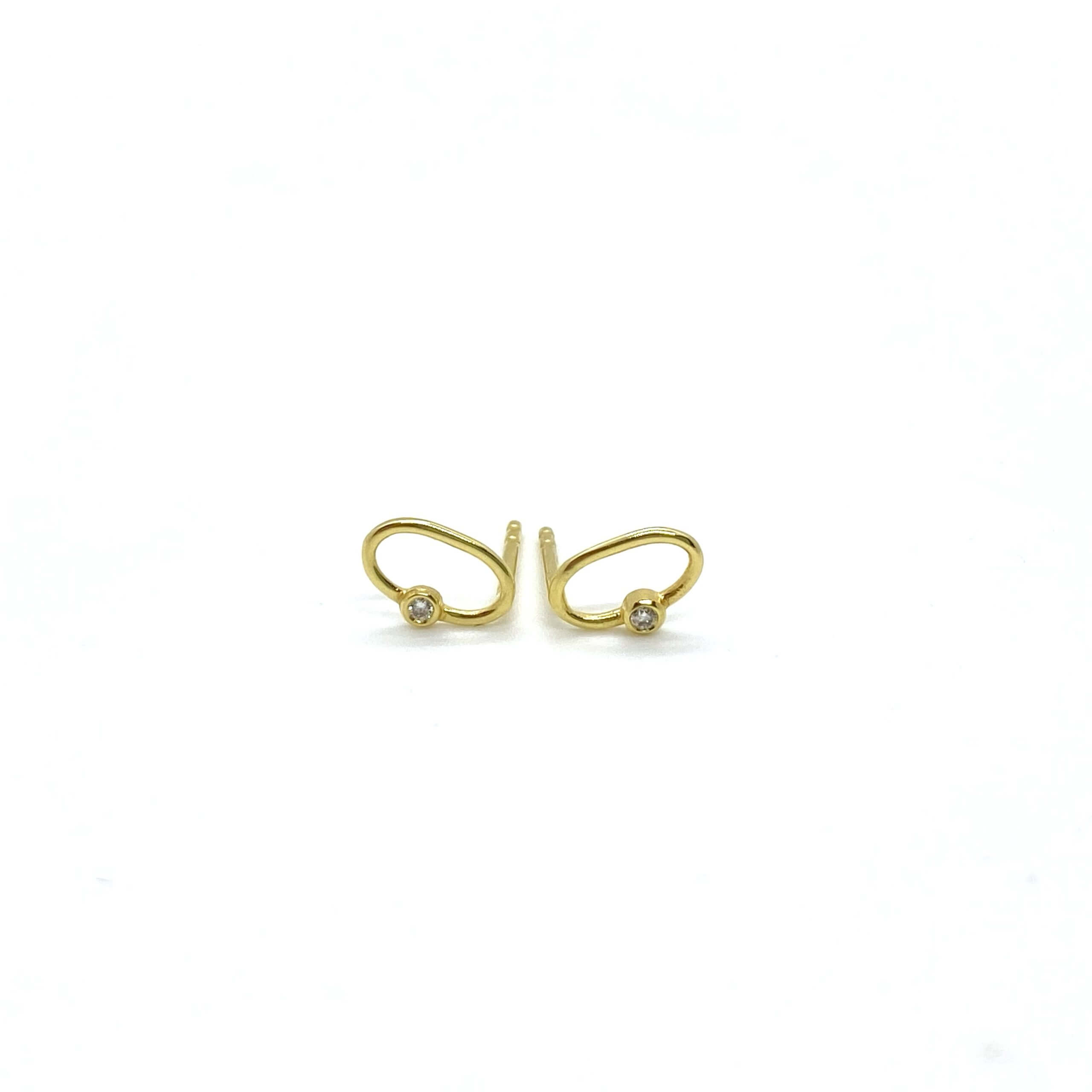 Oval diamond stud earrings — Melina Fachidis